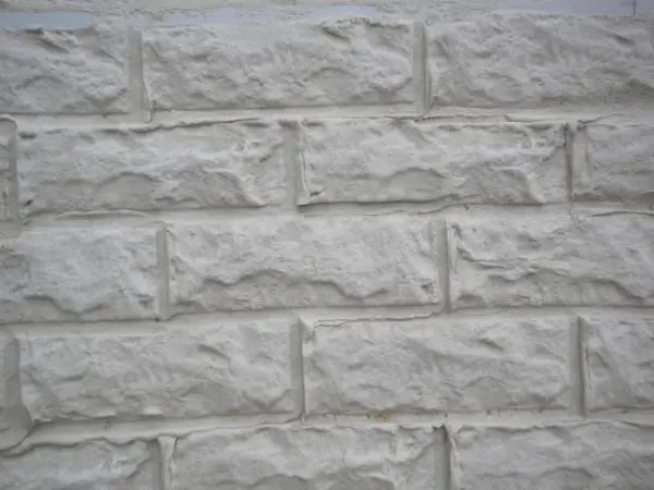 Fachada de monocapa impreso imitación piedra – obra 1